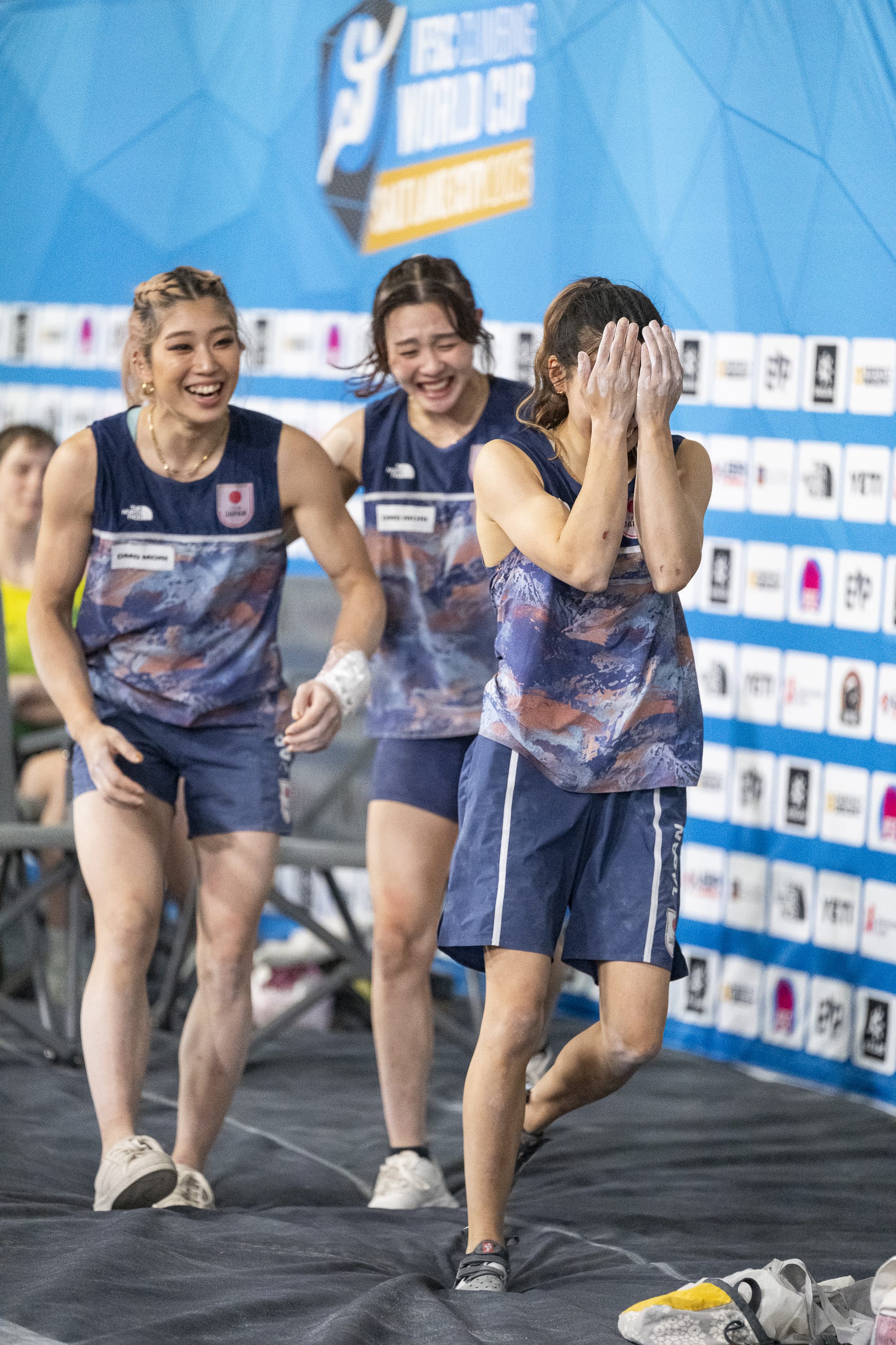 Mao Nakamura with her head in her hands after winning the World Cup