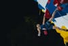 Sorato Anraku resting calmly on the lead wall on his way to winning an Olympic ticket