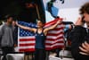 Natalia Grossman celebrates her win with the USA Flag