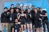 Oriane Bertone celebrates her first gold medal alongside bronze medalists Flavy Cohaut and Mejdi Schalck and the French team