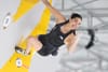 Brooke Raboutou topping the second boulder in the female final