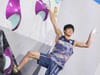 Sorato Anraku celebrating his win at the top of the final boulder