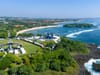 Drone shot of the Bali competition walls on Peninsula Island on the southern coast of Bali